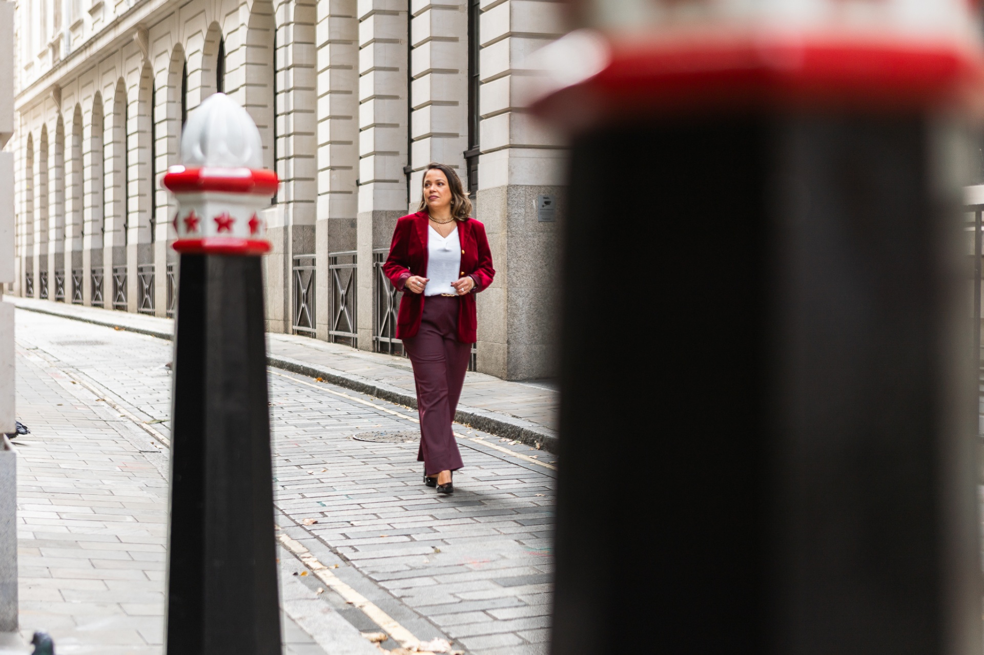 Leticia Fonseca walking in the City of London