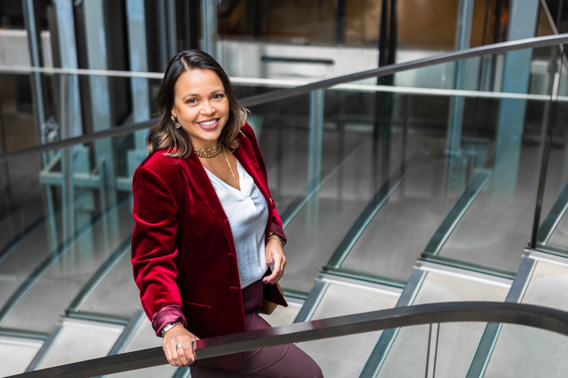 Leticia Fonseca, Independent Financial Adviser, on a staircase in the City of London